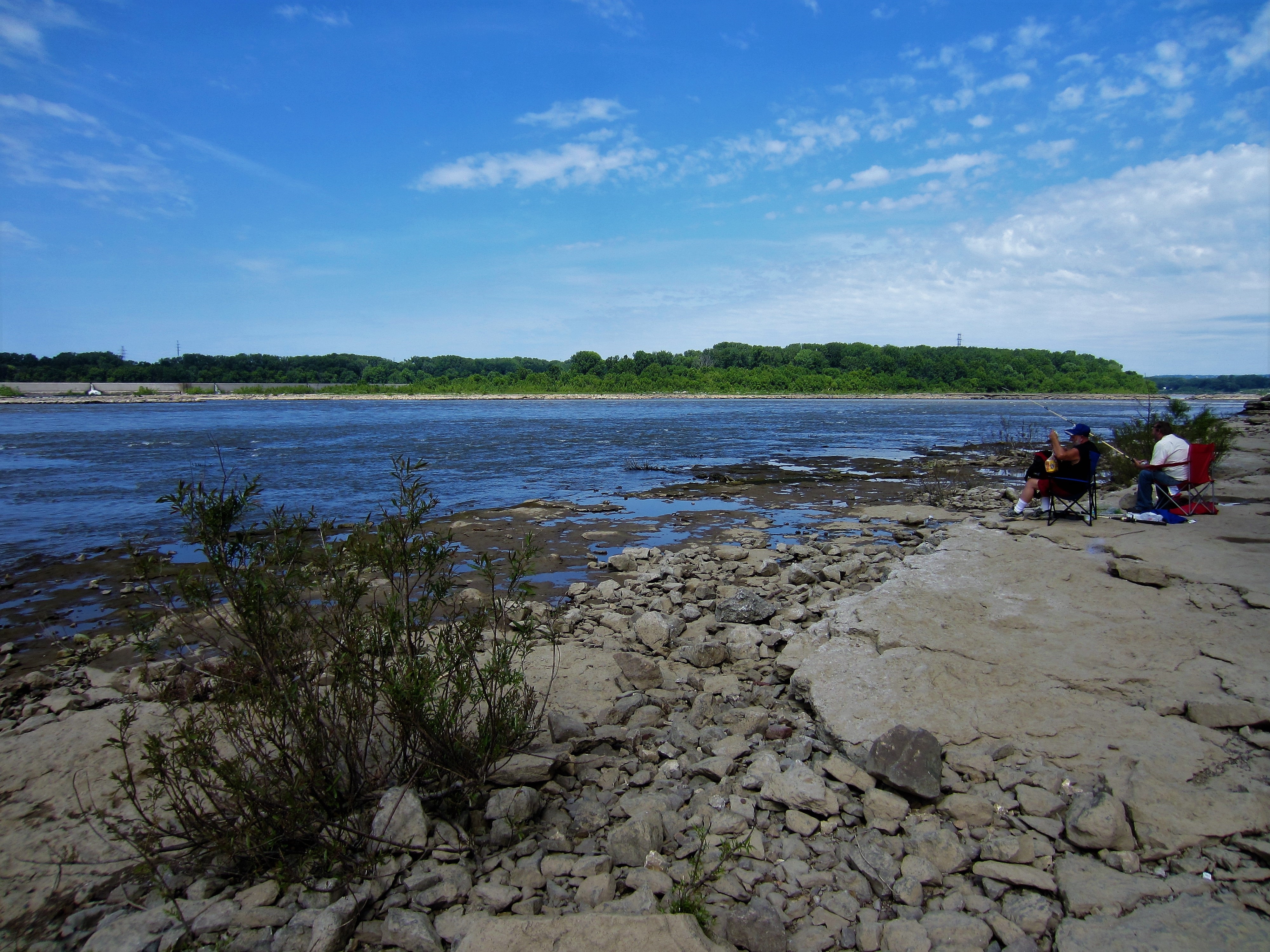 Two men fishing at Falls of the Ohio State Park